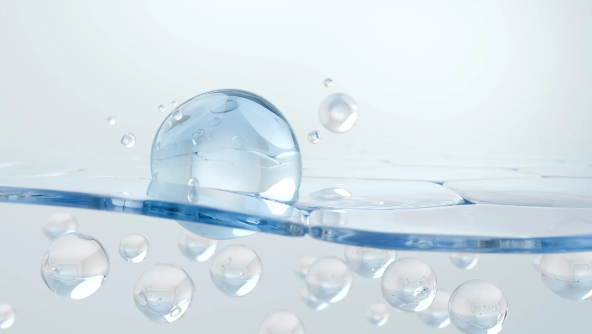 Imagen abstracta de burbujas y gotas de agua azules, representando la tecnolog&iacute;a de penetraci&oacute;n.