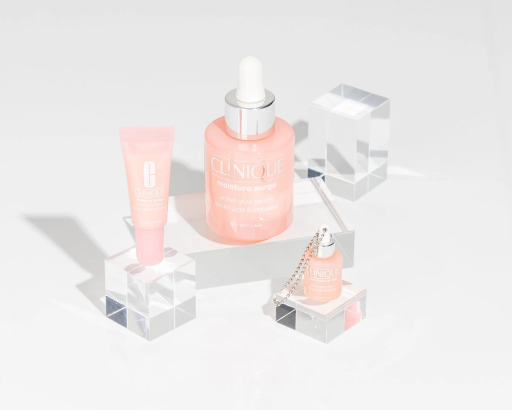 Set Moisture Surge Glow Refine Serum & Charm