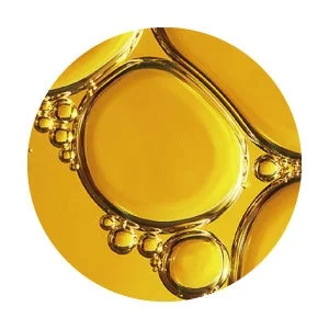 Gotas de aceite en l&iacute;quido amarillo